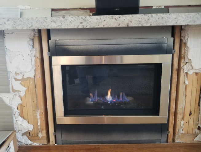 A gas fireplace is being installed, requiring chimney services.